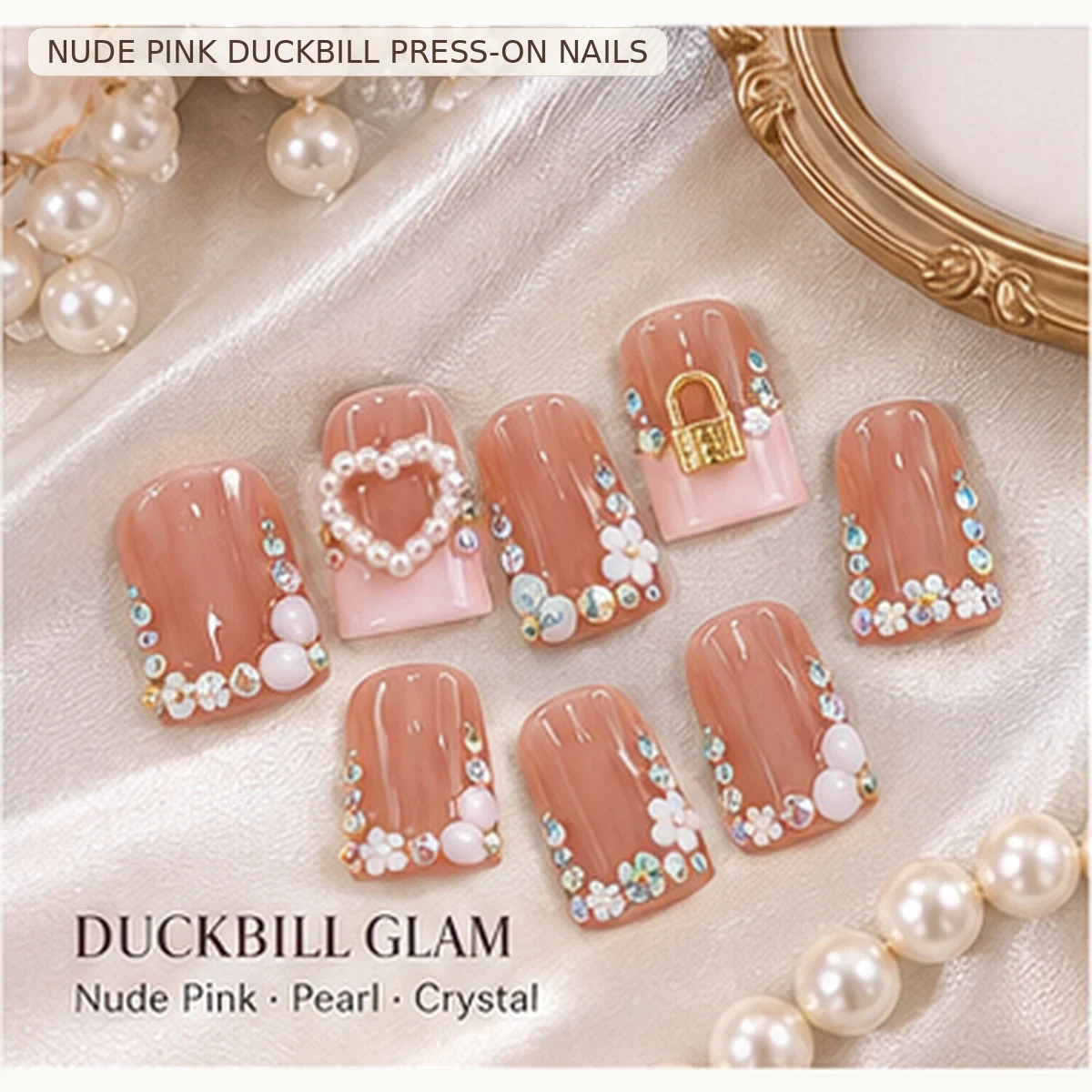 05-zono-nude-pink-duckbill-press-on-nails-flat-lay.webp