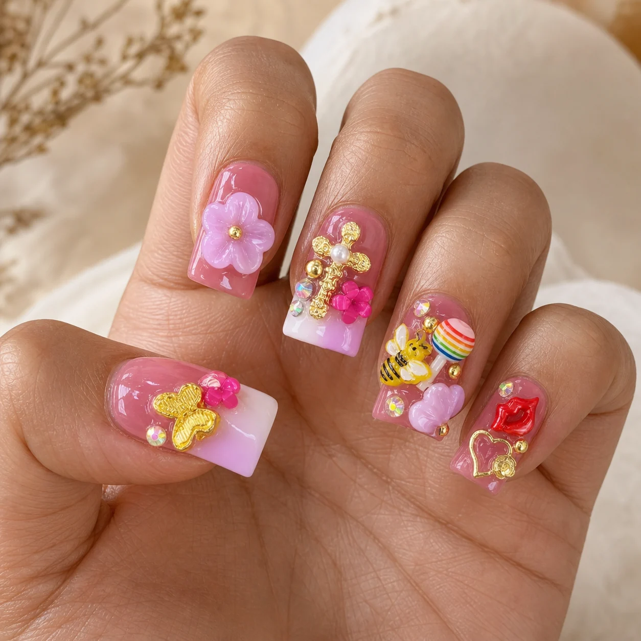 Model wearing Candycore Garden Charm press-on nails, long square