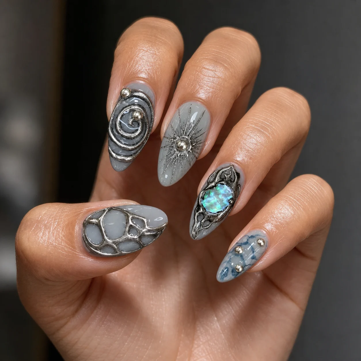 Model wearing Sculptural Chrome Rose press-on nails, long stiletto