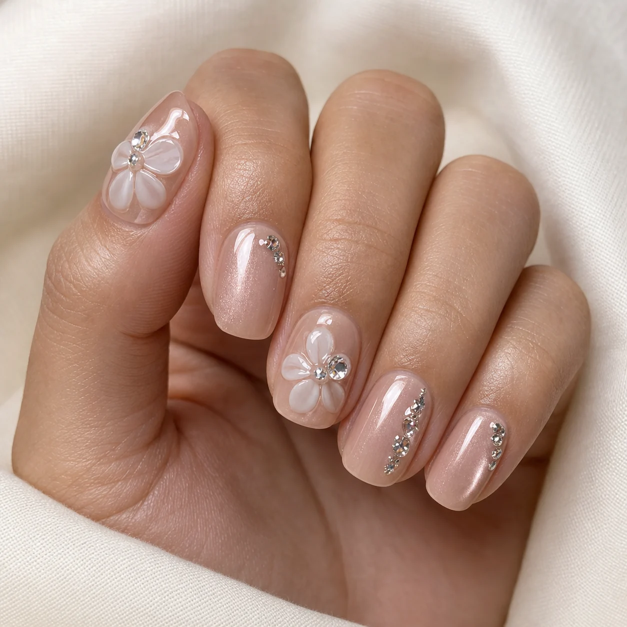 Model wearing Rose Gold Floral press-on nails, short square