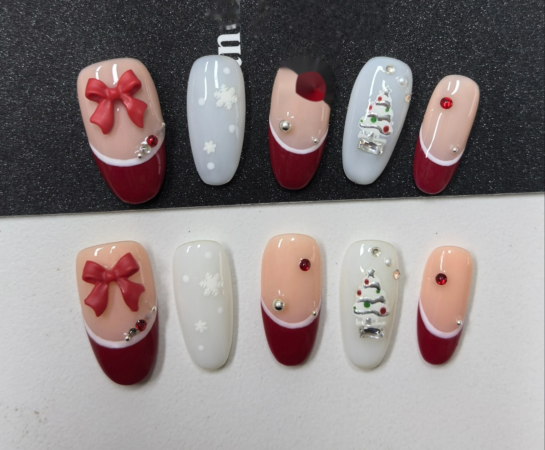 Christmas Tree Red French Press-On Nails — red French tips with bow, Christmas-tree and rhinestone accents